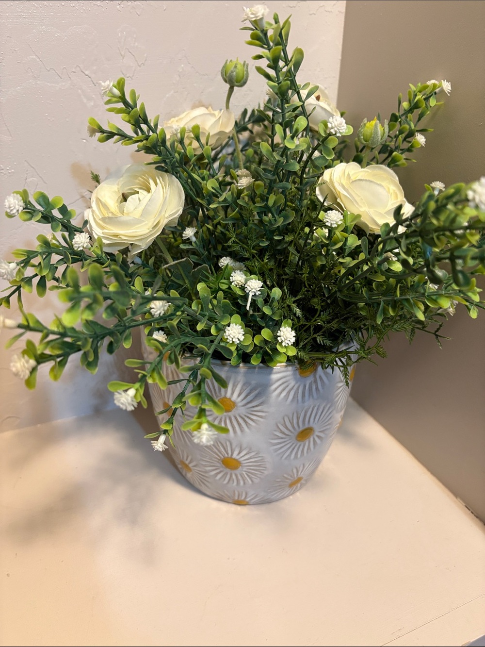 Cream Ranunculus and Greenery in Daisy-Pattern White Ceramic Pot
